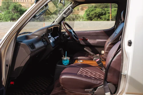 This $18K Toyota Van Hides A Private Bathroom With A Shower In The Back