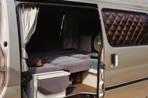 This $18K Toyota Van Hides A Private Bathroom With A Shower In The Back