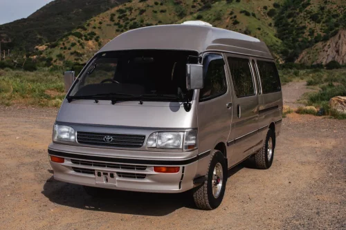 This $18K Toyota Van Hides A Private Bathroom With A Shower In The Back