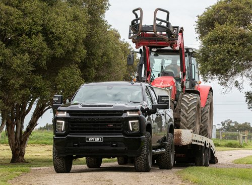 Chevy’s Silverado HD Gets A $13K Fifth-Wheel Hitch That Can Tow Three BYD Pickups