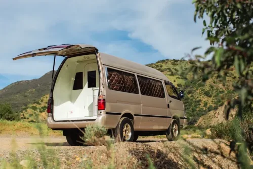 This $18K Toyota Van Hides A Private Bathroom With A Shower In The Back