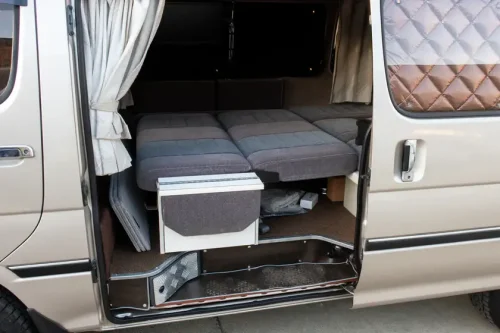 This $18K Toyota Van Hides A Private Bathroom With A Shower In The Back