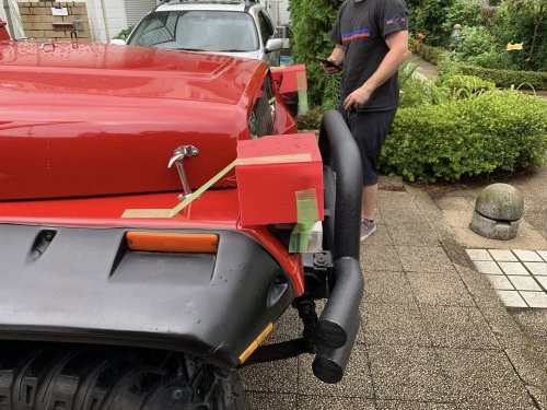A Jeep Missed Japan’s Headlight Rule By An Inch, So He Boxed Them In Cardboard