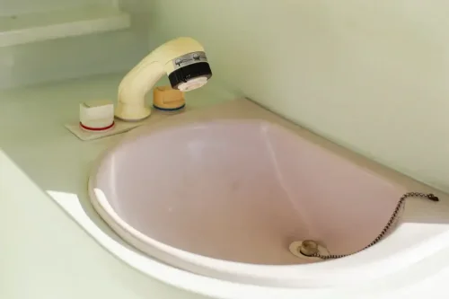 This $18K Toyota Van Hides A Private Bathroom With A Shower In The Back