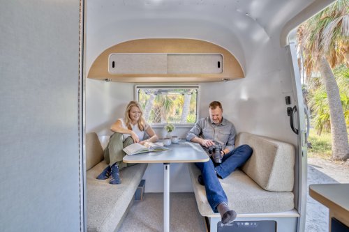 Airstream’s New Baby Camper Fits A Kitchen And A Bed For Two Into 17 Feet