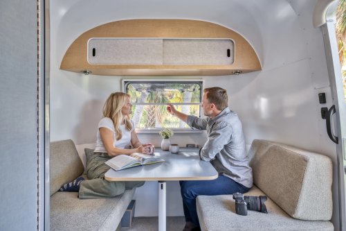 Airstream’s New Baby Camper Fits A Kitchen And A Bed For Two Into 17 Feet