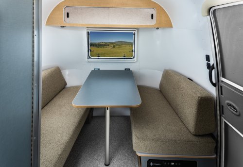 Airstream’s New Baby Camper Fits A Kitchen And A Bed For Two Into 17 Feet