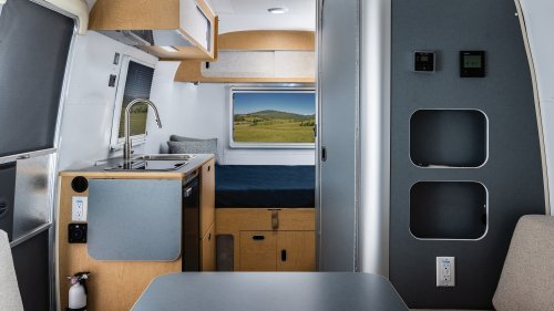 Airstream’s New Baby Camper Fits A Kitchen And A Bed For Two Into 17 Feet