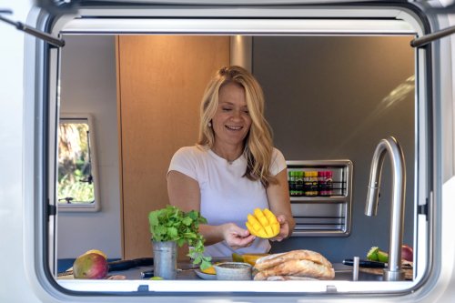 Airstream’s New Baby Camper Fits A Kitchen And A Bed For Two Into 17 Feet