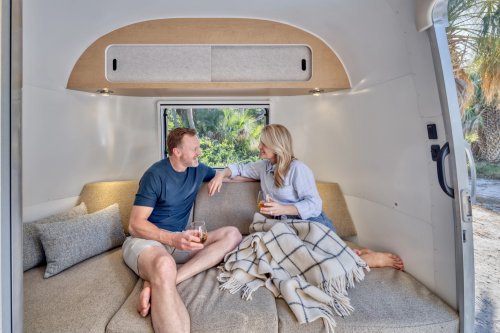 Airstream’s New Baby Camper Fits A Kitchen And A Bed For Two Into 17 Feet