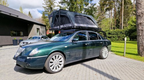 This Lancia Was Built For Italian Politicians, Now It Sleeps Two In A Field