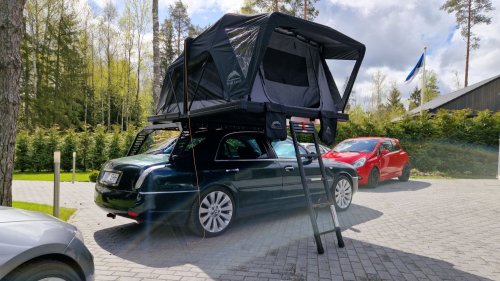 This Lancia Was Built For Italian Politicians, Now It Sleeps Two In A Field