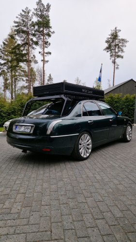 This Lancia Was Built For Italian Politicians, Now It Sleeps Two In A Field