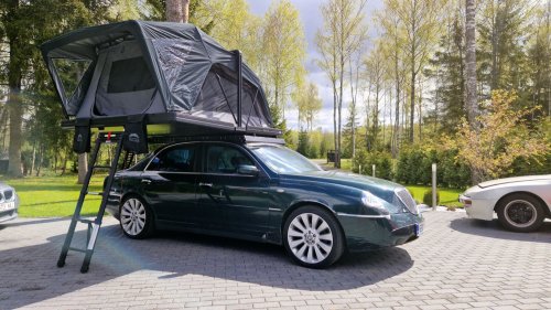 This Lancia Was Built For Italian Politicians, Now It Sleeps Two In A Field
