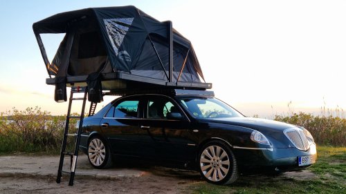 This Lancia Was Built For Italian Politicians, Now It Sleeps Two In A Field