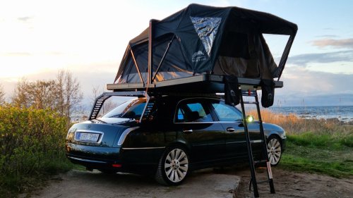 This Lancia Was Built For Italian Politicians, Now It Sleeps Two In A Field