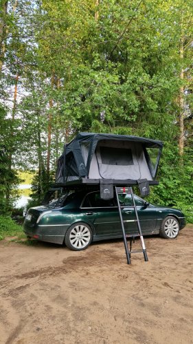 This Lancia Was Built For Italian Politicians, Now It Sleeps Two In A Field