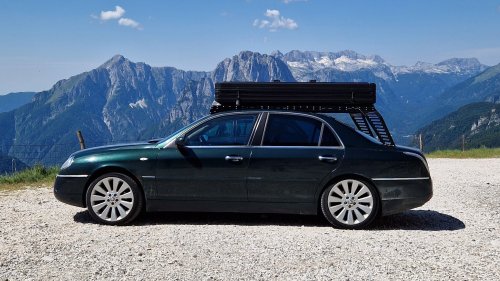 This Lancia Was Built For Italian Politicians, Now It Sleeps Two In A Field