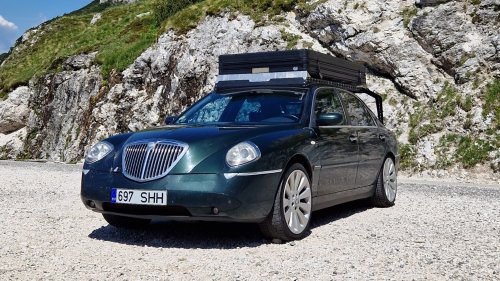 This Lancia Was Built For Italian Politicians, Now It Sleeps Two In A Field