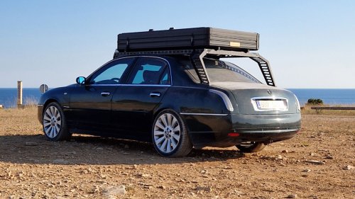 This Lancia Was Built For Italian Politicians, Now It Sleeps Two In A Field