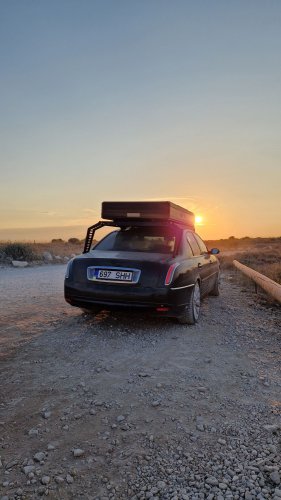 This Lancia Was Built For Italian Politicians, Now It Sleeps Two In A Field