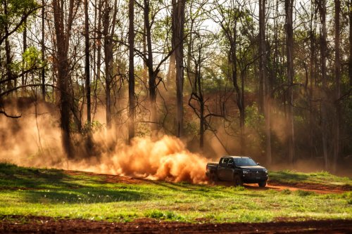 Mitsubishi’s $71,200 Brown Pickup Projects A Horse Onto The Pavement