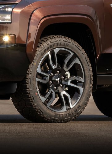 Mitsubishi’s $71,200 Brown Pickup Projects A Horse Onto The Pavement