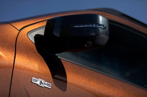 Mitsubishi’s $71,200 Brown Pickup Projects A Horse Onto The Pavement