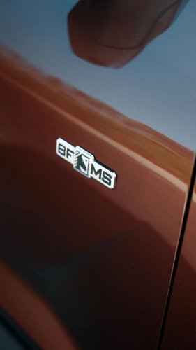 Mitsubishi’s $71,200 Brown Pickup Projects A Horse Onto The Pavement