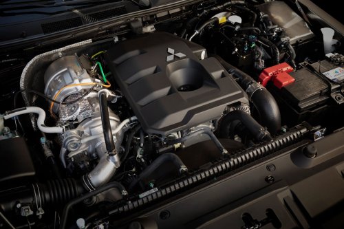 Mitsubishi’s $71,200 Brown Pickup Projects A Horse Onto The Pavement