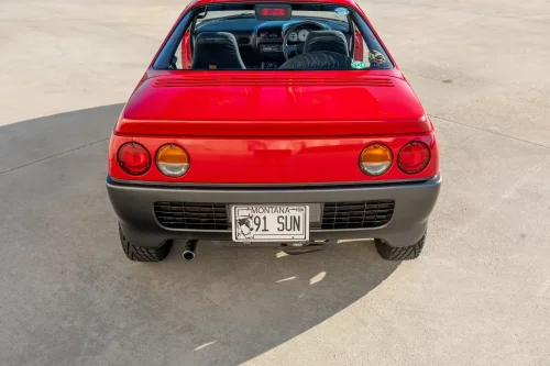 Suzuki’s Tiny Mid-Engine Supercar Has Gullwing Doors And Just 64 HP