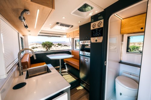 $300K Camper Has A Fold-Out Balcony For The Middle Of Nowhere And A Hemi To Get You There