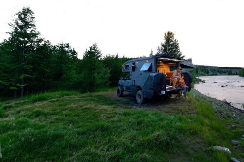 $300K Camper Has A Fold-Out Balcony For The Middle Of Nowhere And A Hemi To Get You There
