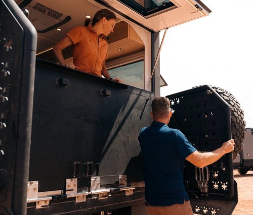 $300K Camper Has A Fold-Out Balcony For The Middle Of Nowhere And A Hemi To Get You There