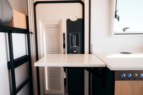 $300K Camper Has A Fold-Out Balcony For The Middle Of Nowhere And A Hemi To Get You There