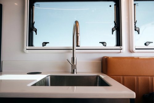 $300K Camper Has A Fold-Out Balcony For The Middle Of Nowhere And A Hemi To Get You There