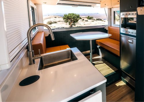 $300K Camper Has A Fold-Out Balcony For The Middle Of Nowhere And A Hemi To Get You There