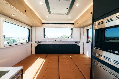$300K Camper Has A Fold-Out Balcony For The Middle Of Nowhere And A Hemi To Get You There