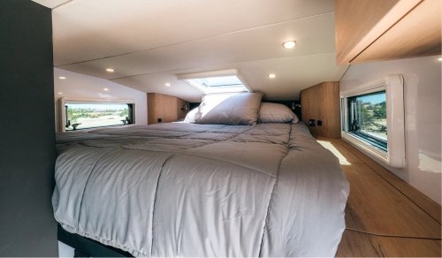 $300K Camper Has A Fold-Out Balcony For The Middle Of Nowhere And A Hemi To Get You There