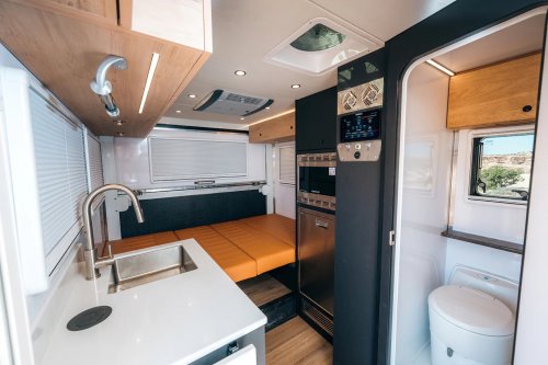 $300K Camper Has A Fold-Out Balcony For The Middle Of Nowhere And A Hemi To Get You There
