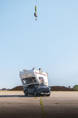 Toyota Crushed The Hilux BEV With A Caravan Because Internet Nostalgia Demanded It