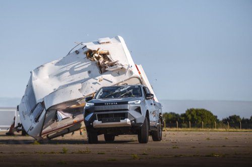 Toyota Crushed The Hilux BEV With A Caravan Because Internet Nostalgia Demanded It