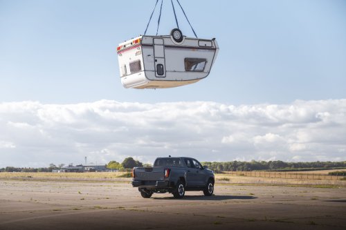 Toyota Crushed The Hilux BEV With A Caravan Because Internet Nostalgia Demanded It
