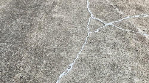 How To Fix Unsightly Concrete Cracks Like A DIY Master