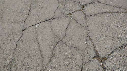 How To Fix Unsightly Concrete Cracks Like A DIY Master