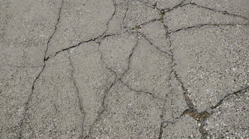 How To Fix Unsightly Concrete Cracks Like A DIY Master