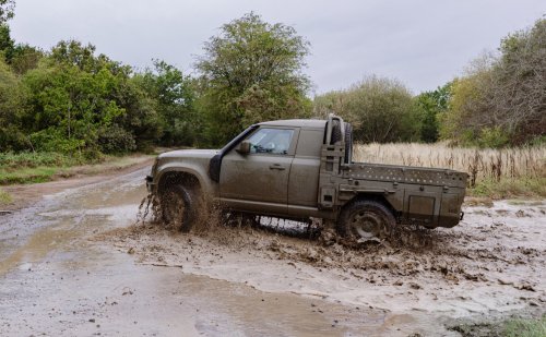 You’d Never Expect Land Rover’s Luxe New Defender To Pull Off Military-Spec This Well