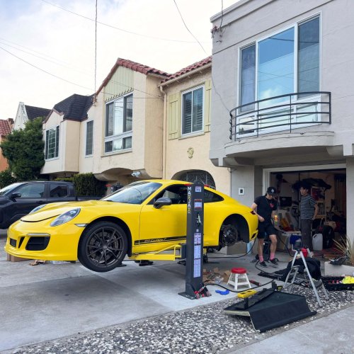 This Disappearing Driveway Lift Setup Is a Next-Level Home Mechanic Move