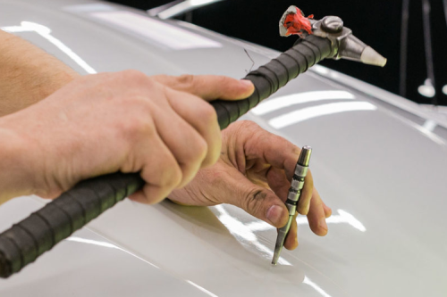 Membedah Perbedaan Antara Paintless Dent Repair dan Ketok Magic