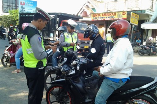 Kena Tilang di Luar Kota, Begini Cara Ambil SIM Tanpa Hadiri Sidang